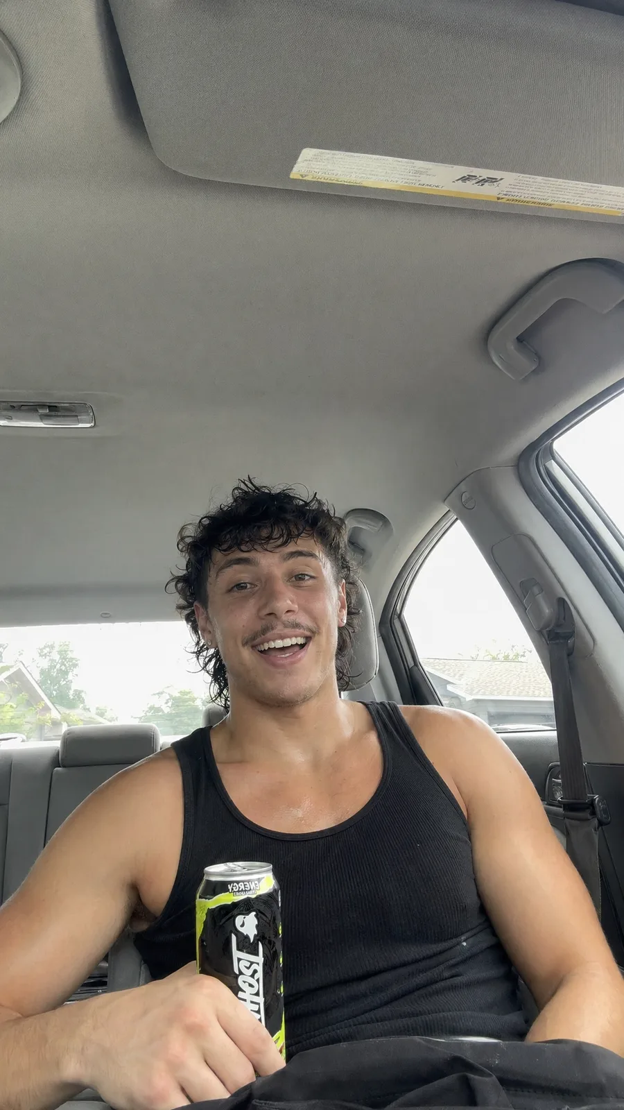 gym bro drinking my energy drink in his car sweaty