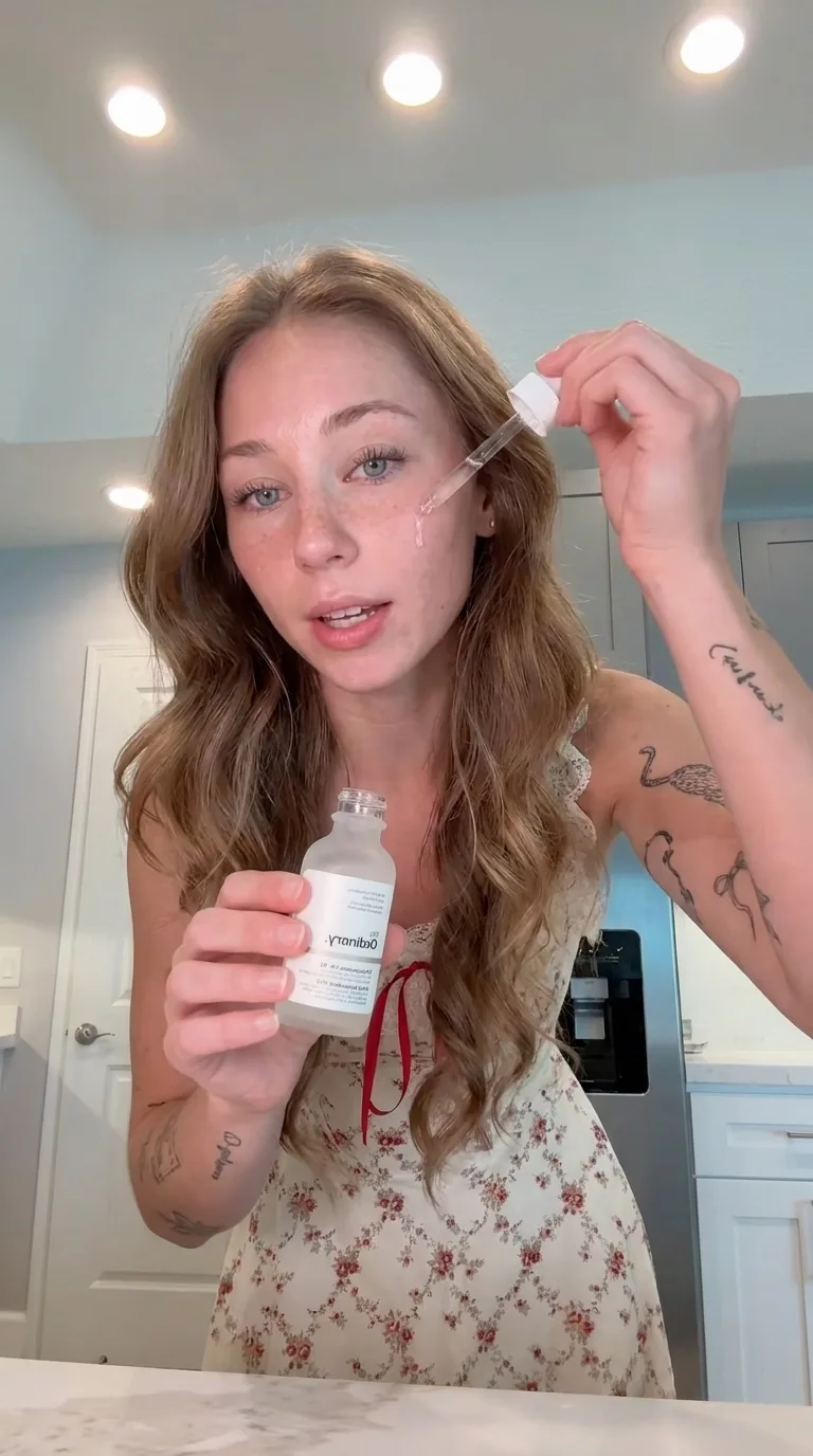 have my avatar put my product on her face in a normal kitchen while talking